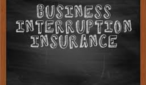 How does business interruption insurance work in the UK, and why is it important?