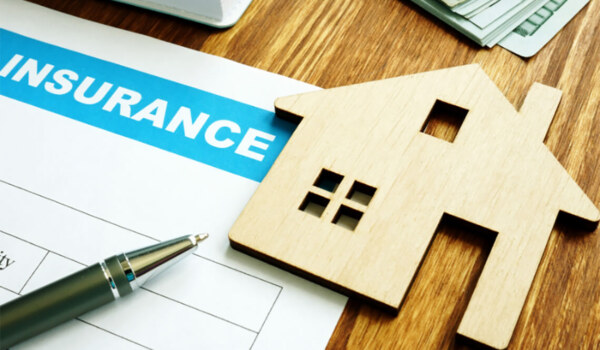 What are the main types of insurance required for UK homeowners?